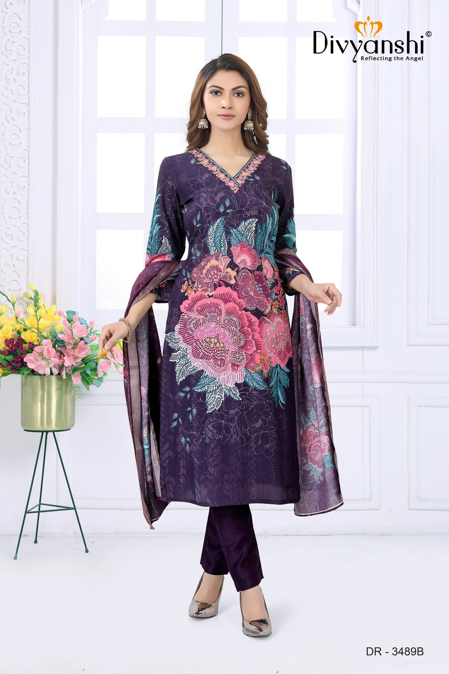 Desginer Kurti with Stylist detailed handwork at V Neck comes along with matching pant and dupatta to complete with look (DR3489B)