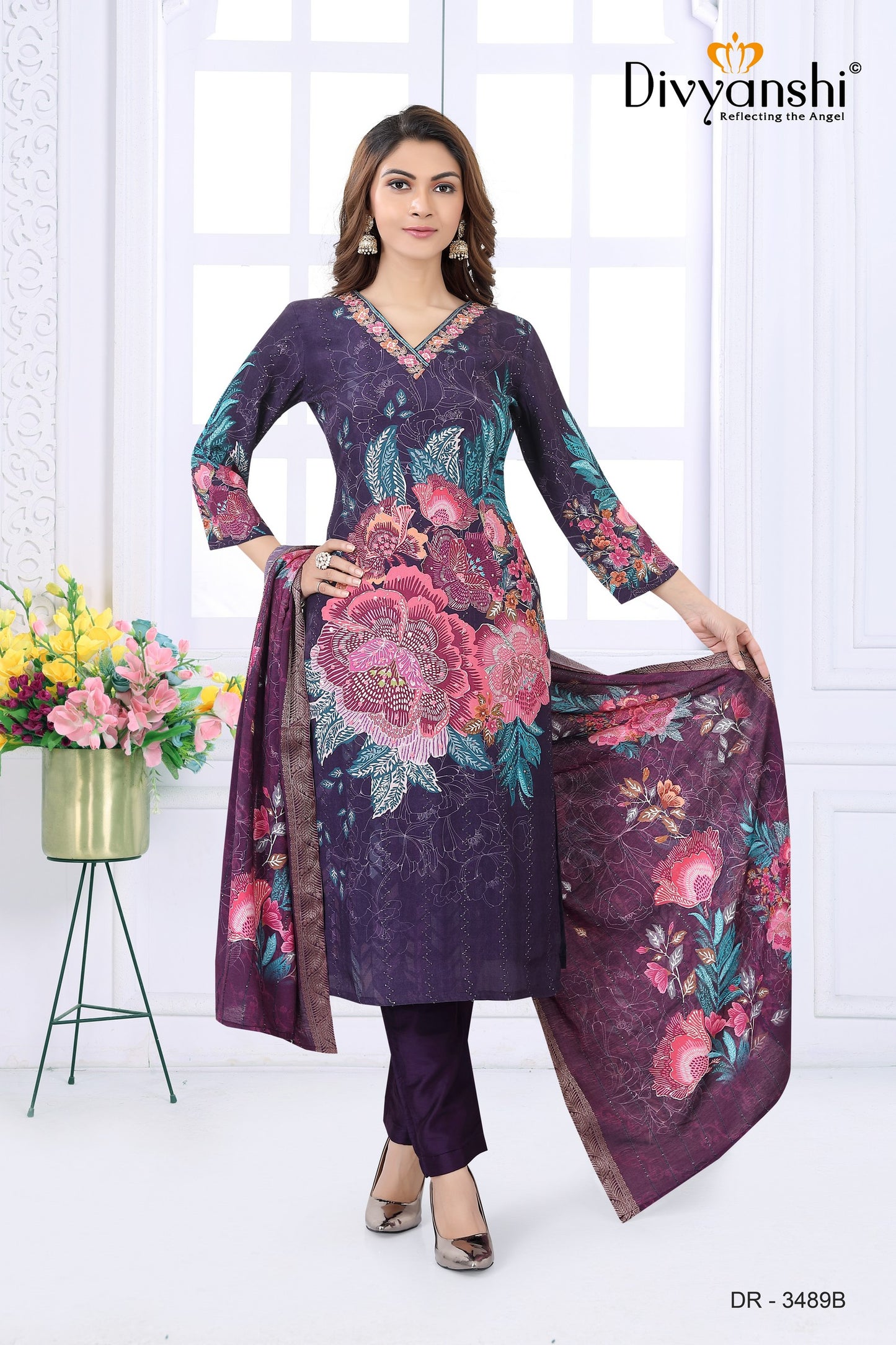 Desginer Kurti with Stylist detailed handwork at V Neck comes along with matching pant and dupatta to complete with look (DR3489B)