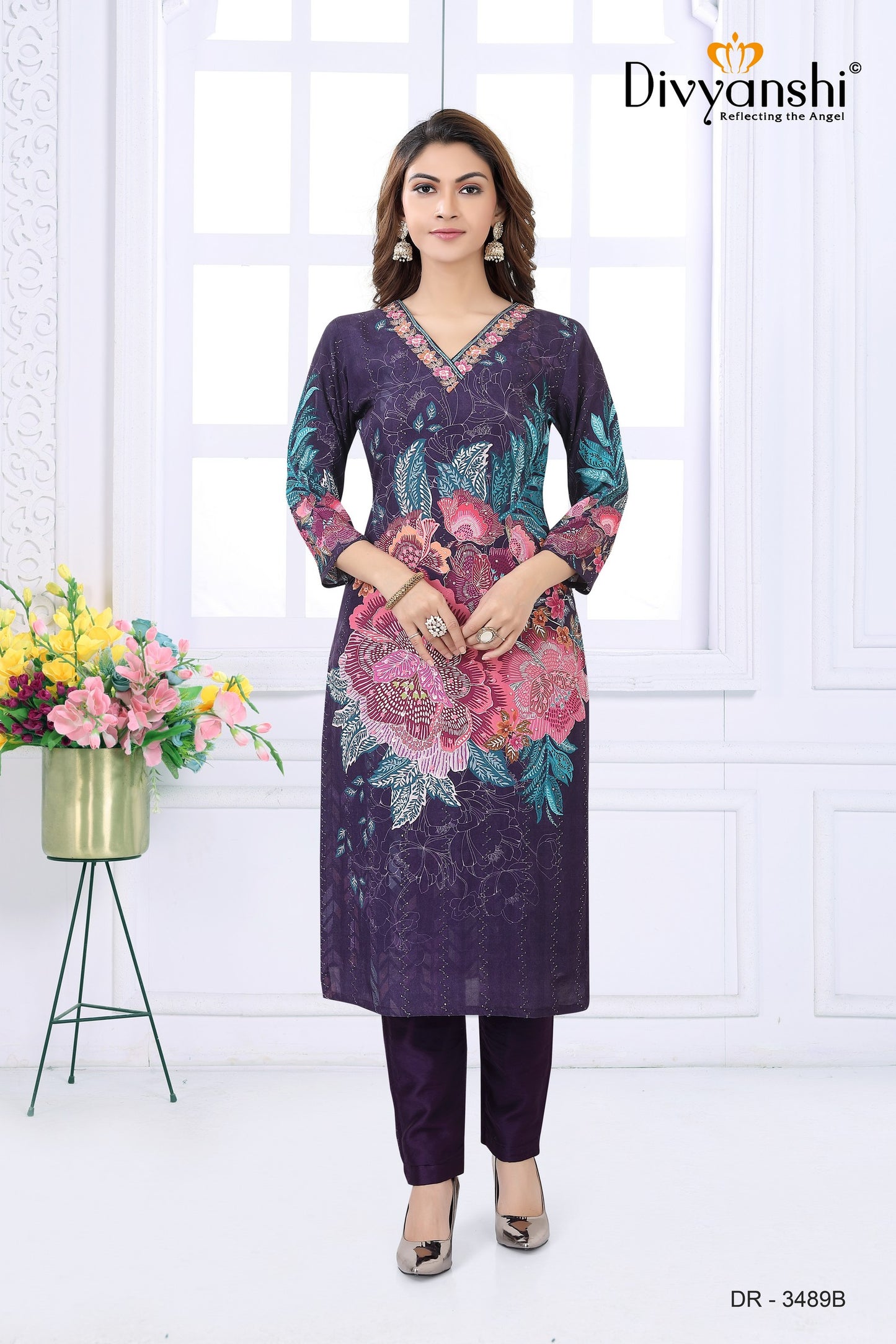 Desginer Kurti with Stylist detailed handwork at V Neck comes along with matching pant and dupatta to complete with look (DR3489B)