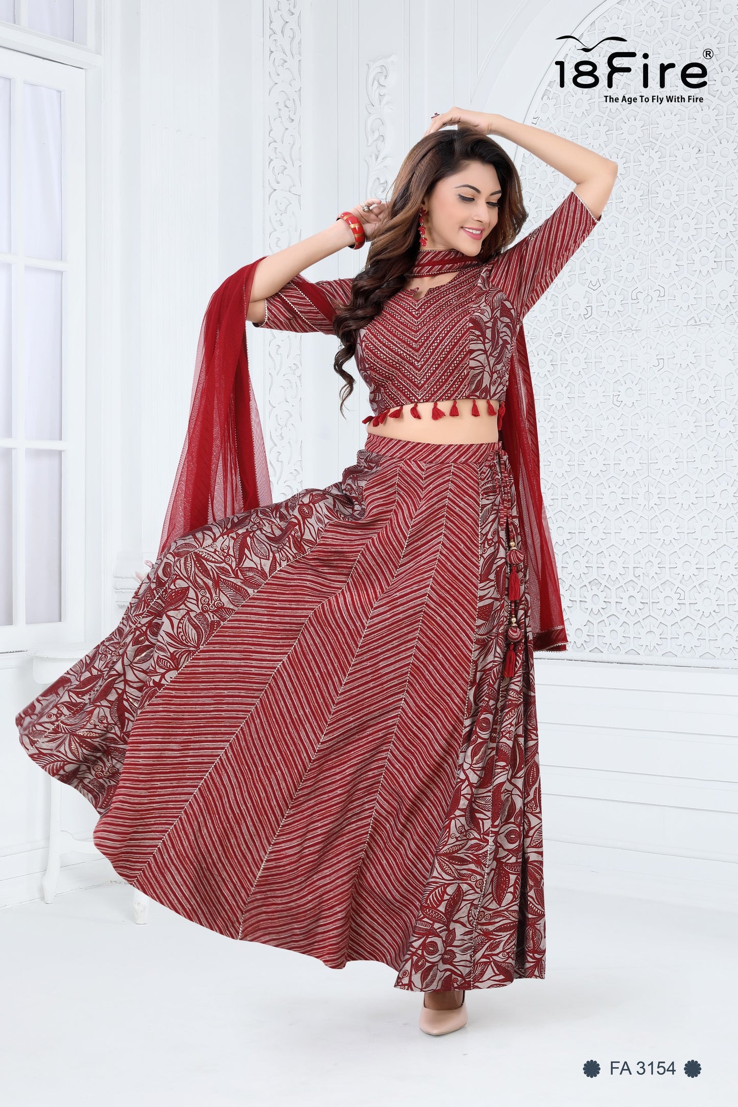 Maroon stripped pattern lehenga choli set with a modern design with hint of detailed handwork