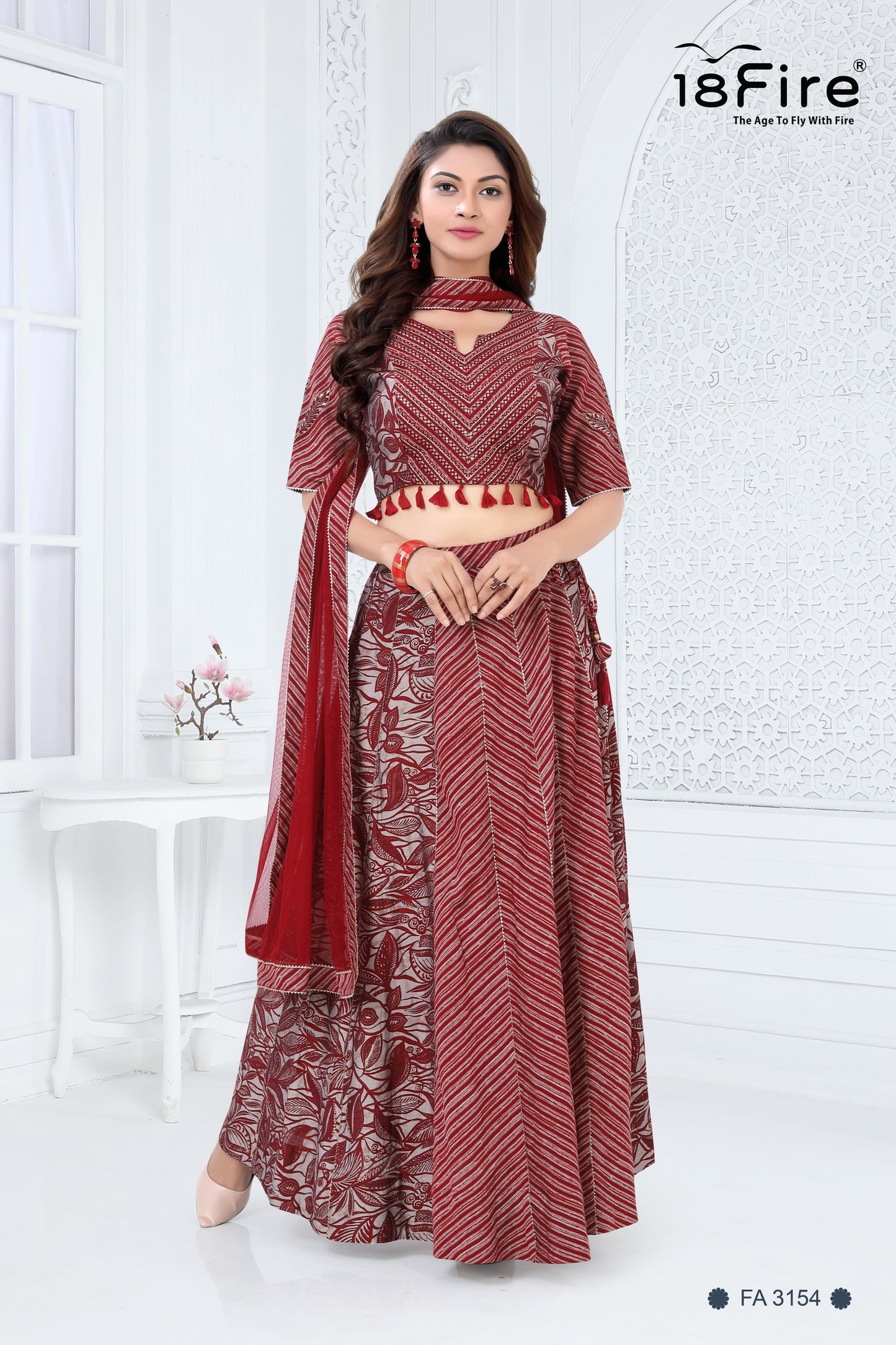Maroon stripped pattern lehenga choli set with a modern design with hint of detailed handwork