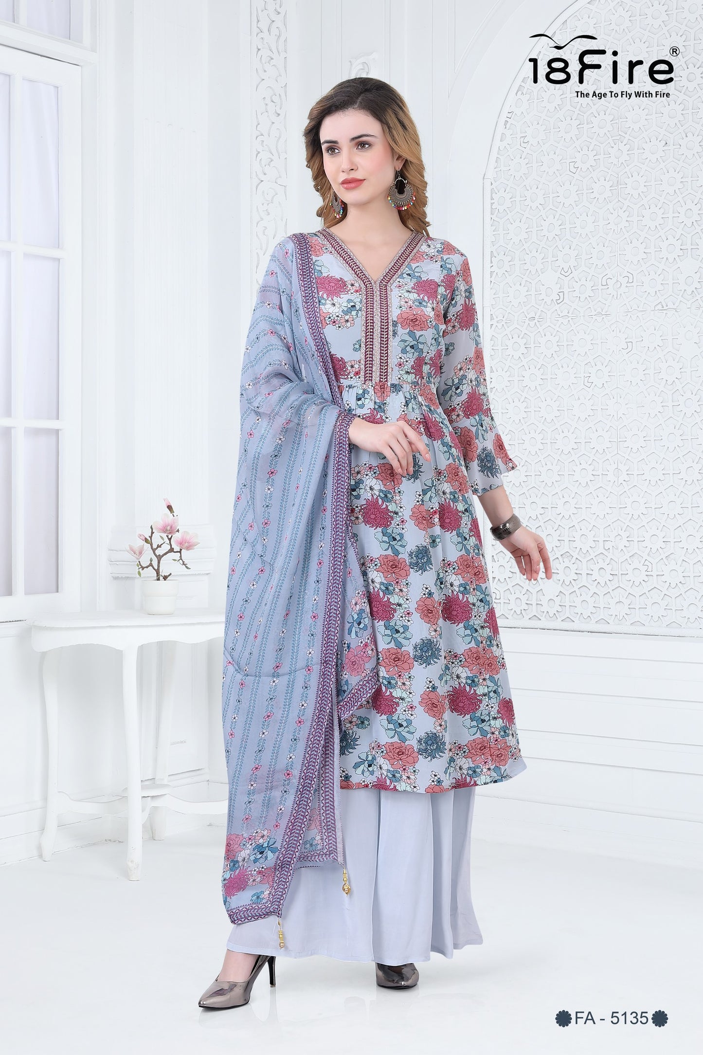 Elevate your ethnic wardrobe with the exquisite Floral Printed Leheriya Kurti Pant Set with Dupatta (FA5135)