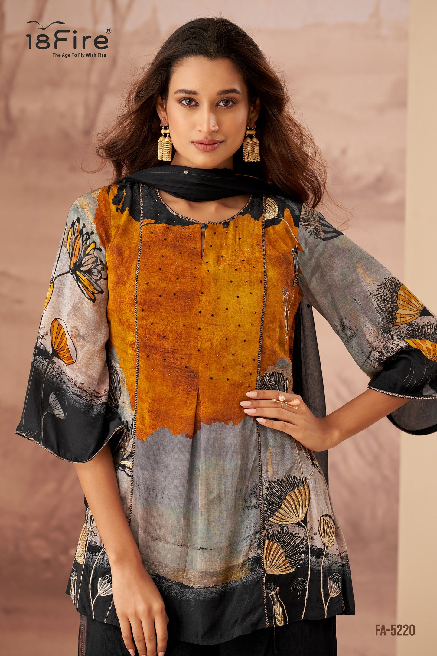 These silhouettes honor movement—flowy sleeves, asymmetrical hems, and handwork that catches the eye. (FA5220)