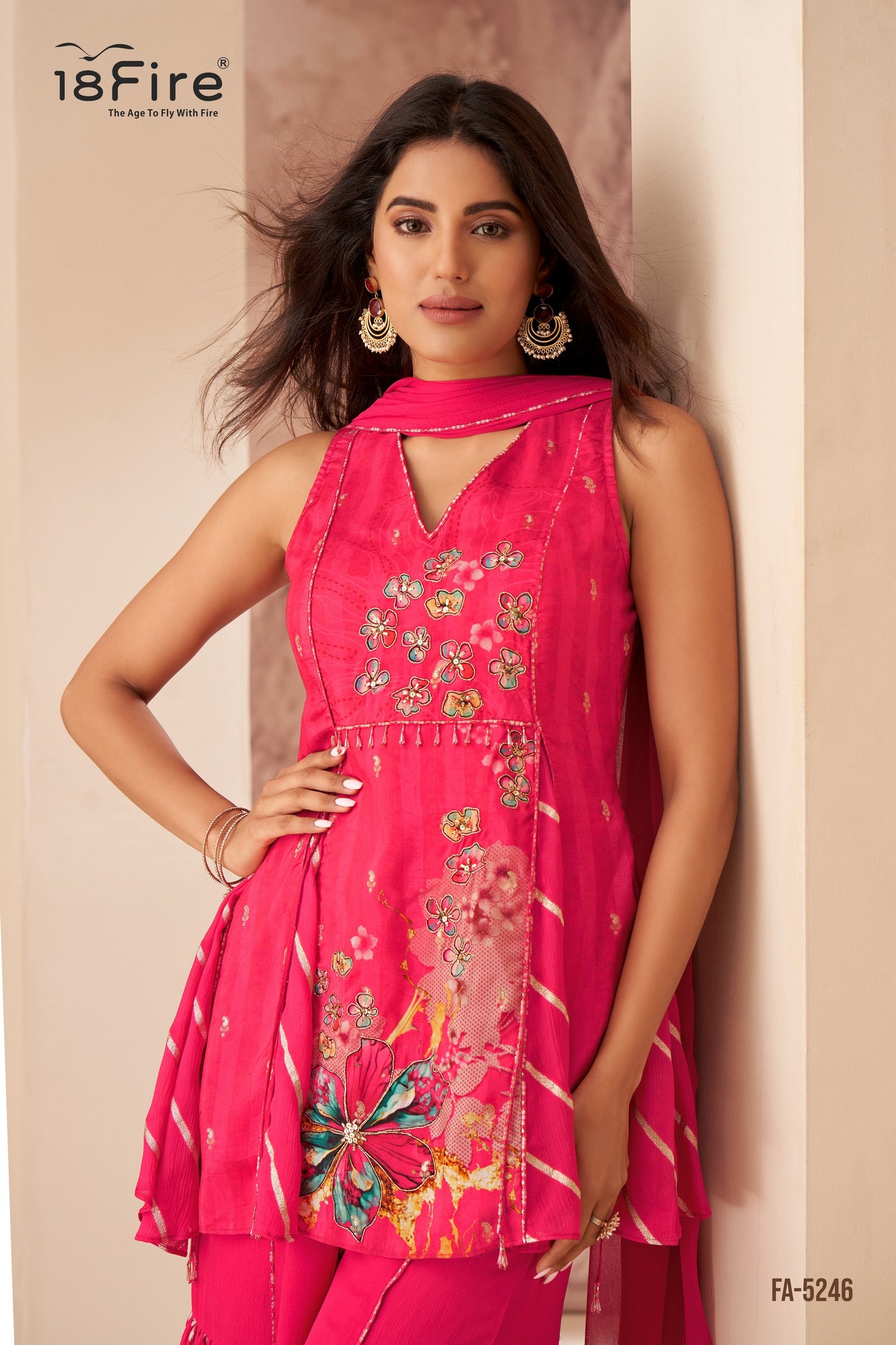 This fuchsia pink set blooms with vibrant floral embroidery, a sleek high neckline, and playful palazzos with gathered texture (FA5246)