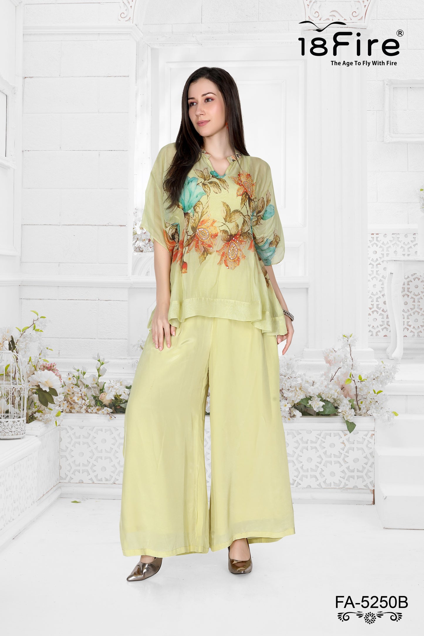 This elegant ethnic ensemble collection features a beautifully coordinated tunic and palazzo set (FA5250B)
