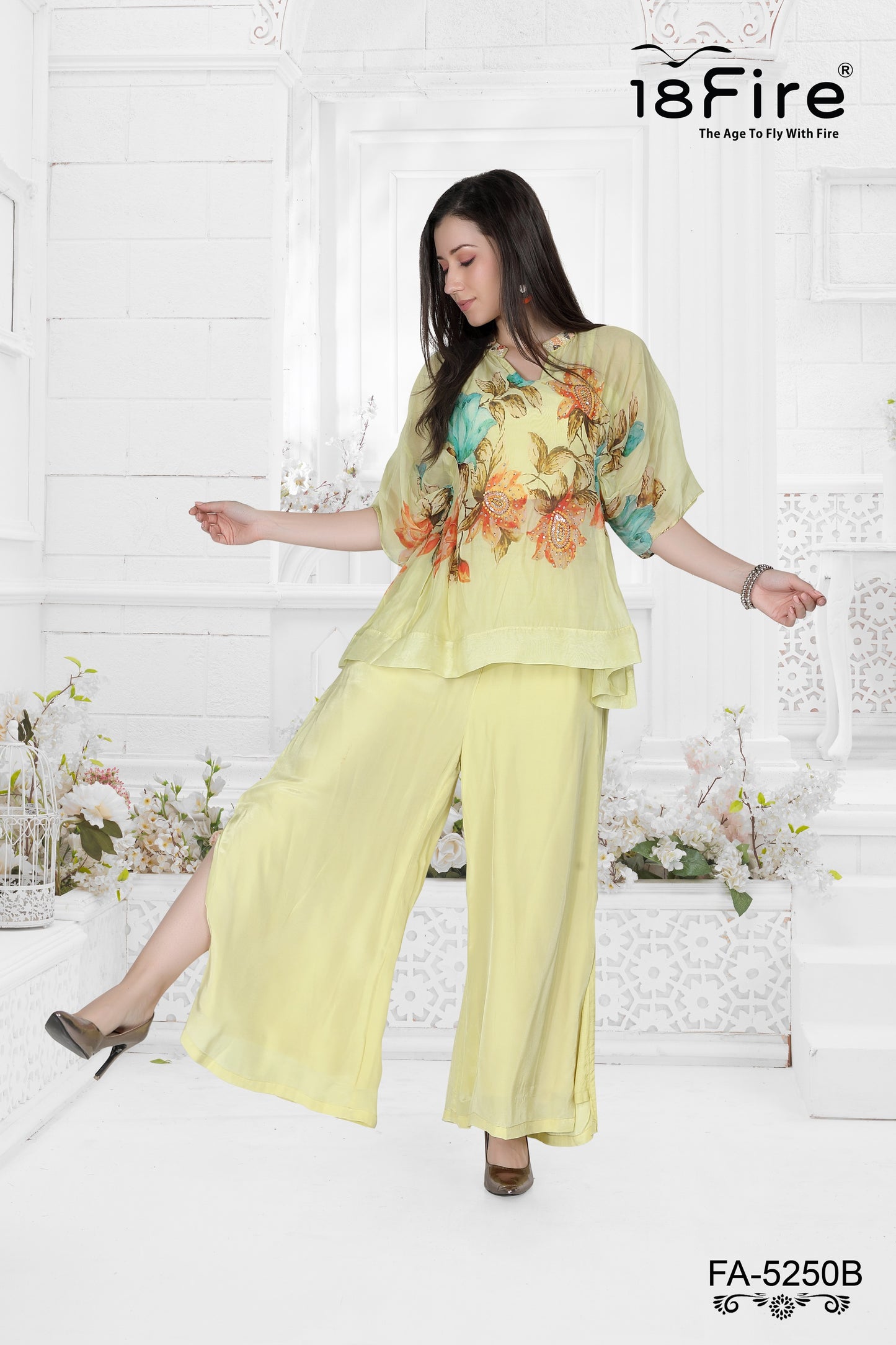 This elegant ethnic ensemble collection features a beautifully coordinated tunic and palazzo set (FA5250B)