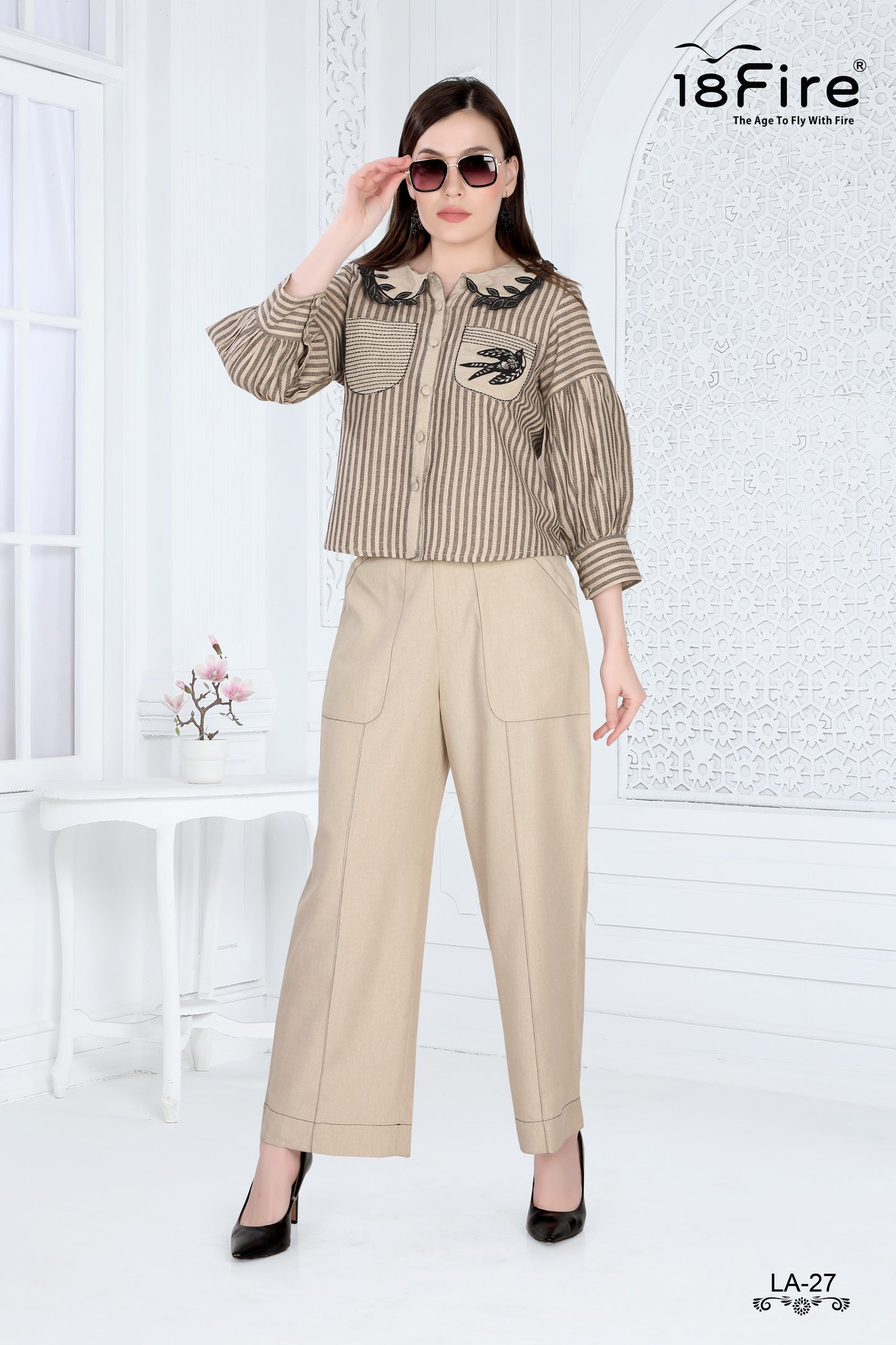 Fashionable Cord Set ensemble consisting of a striped top and beige trousers (LA27)