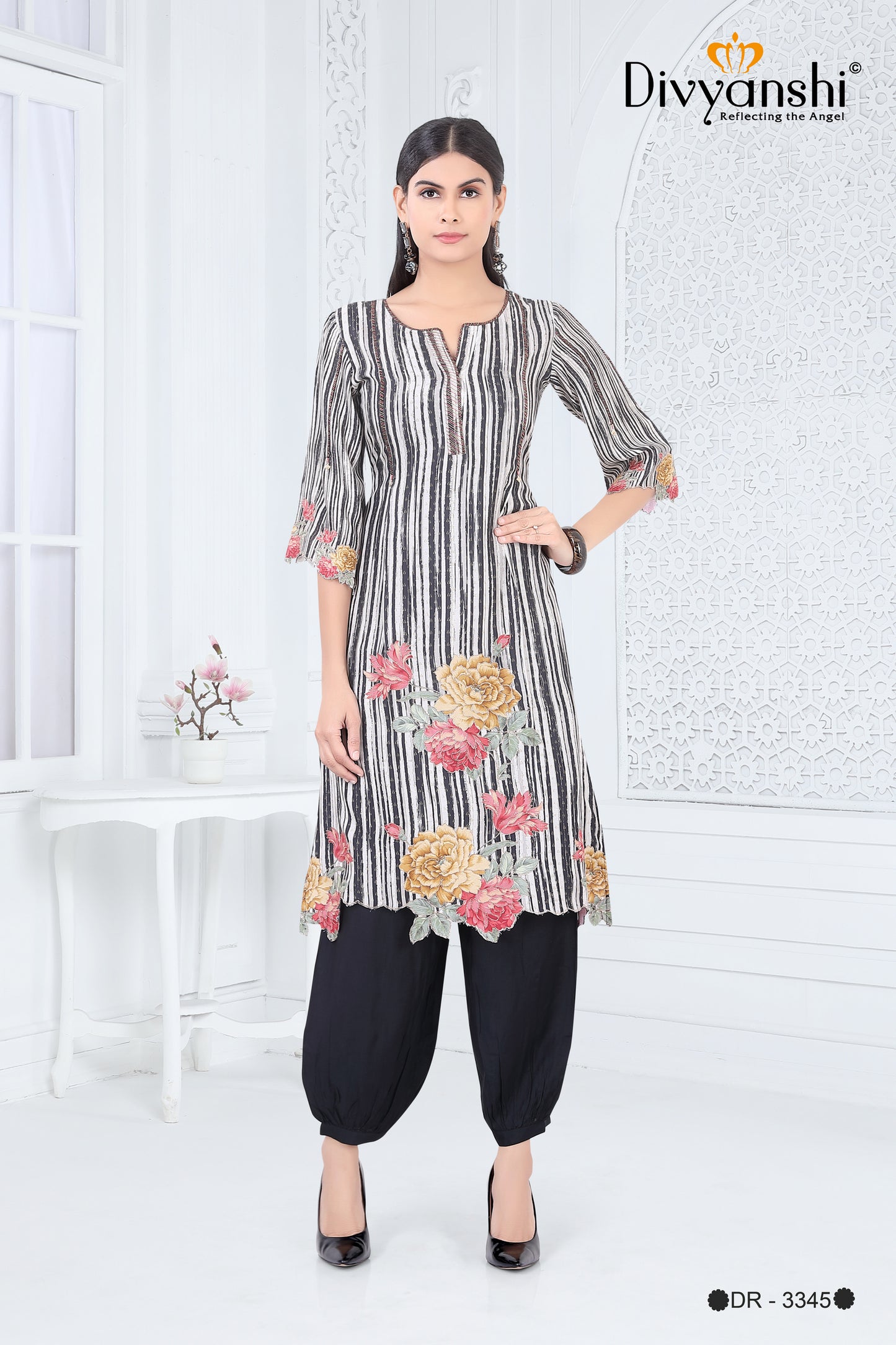 A Line Black & White Designer Kurti with hint of Floral Artwork paired with matching bottom (DR3345)