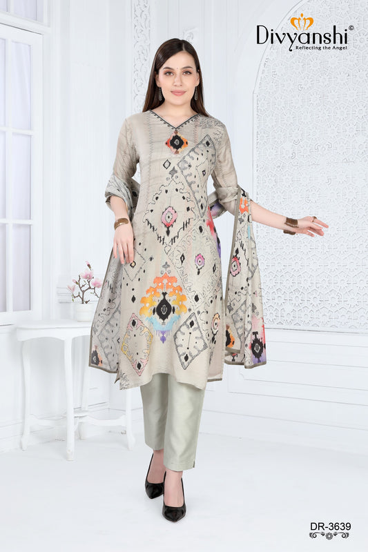 This three piece designer set with colorful geometric pattern paired with matching pant and dupatta (DR3639)